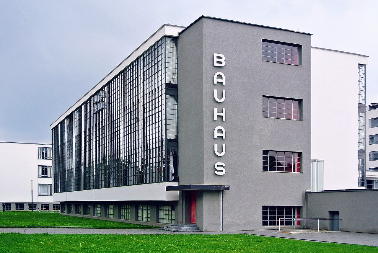 A famous modern building with clean white walls and big windows.