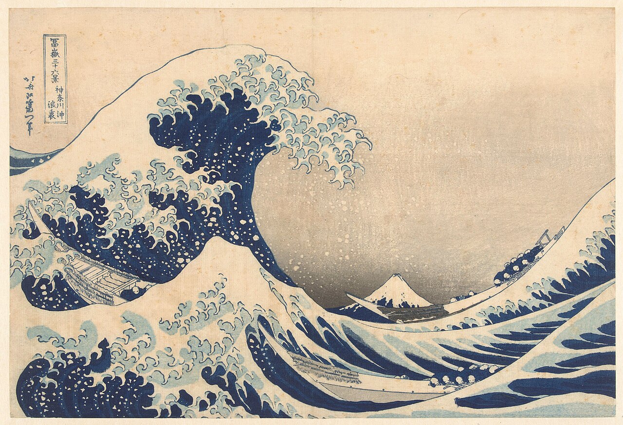 The famous Japanese print of a huge blue wave curling over boats.