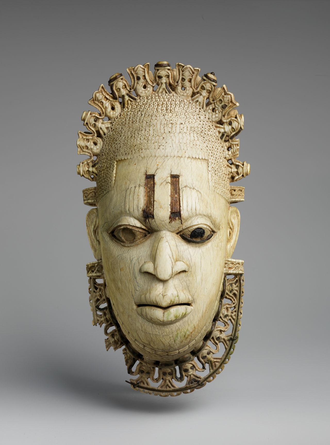 A small sculpture carved from bone long ago.