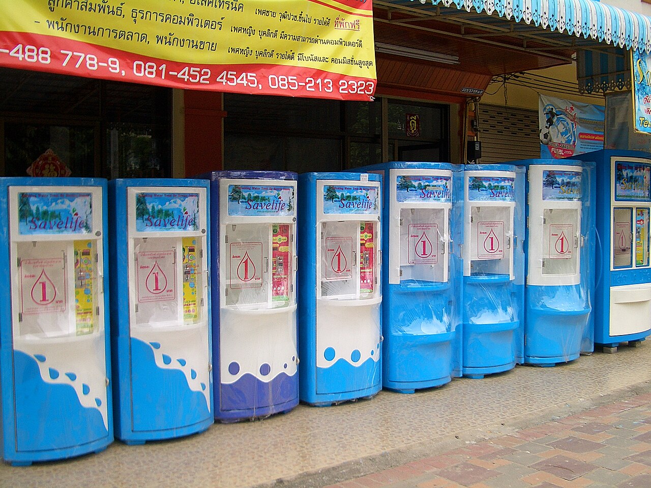 People fill up their own bottles with clean drinking water.