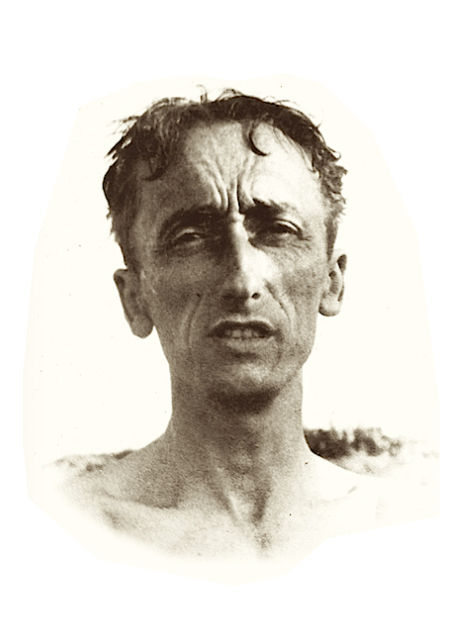 Jacques Cousteau and his diving friends pose together.