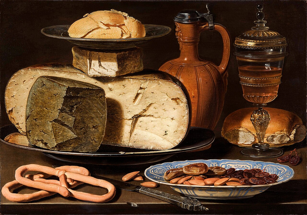 An old painting showing cheese, almonds, and pretzels on a table.