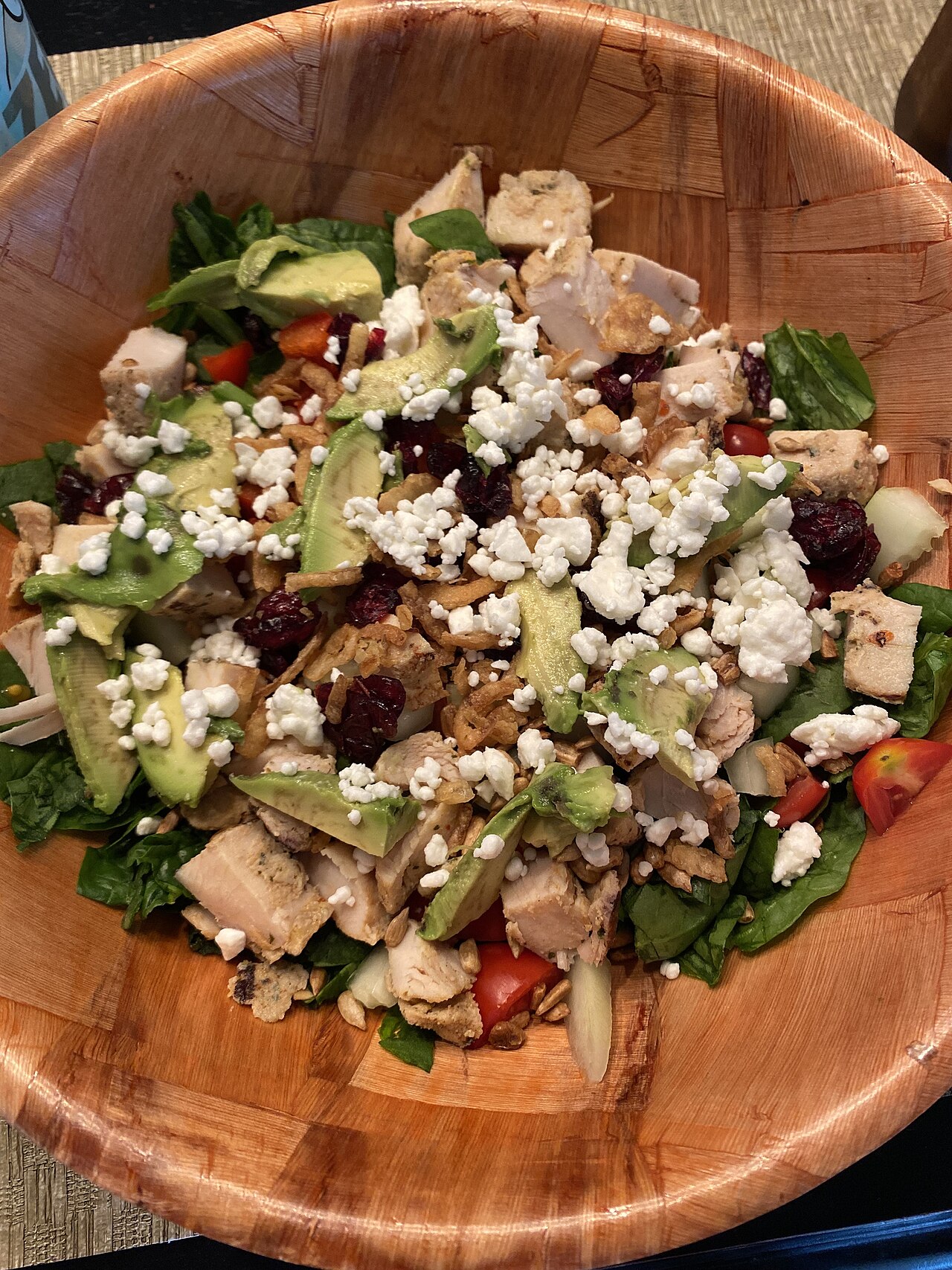 A big, colorful mixed salad full of fresh veggies.