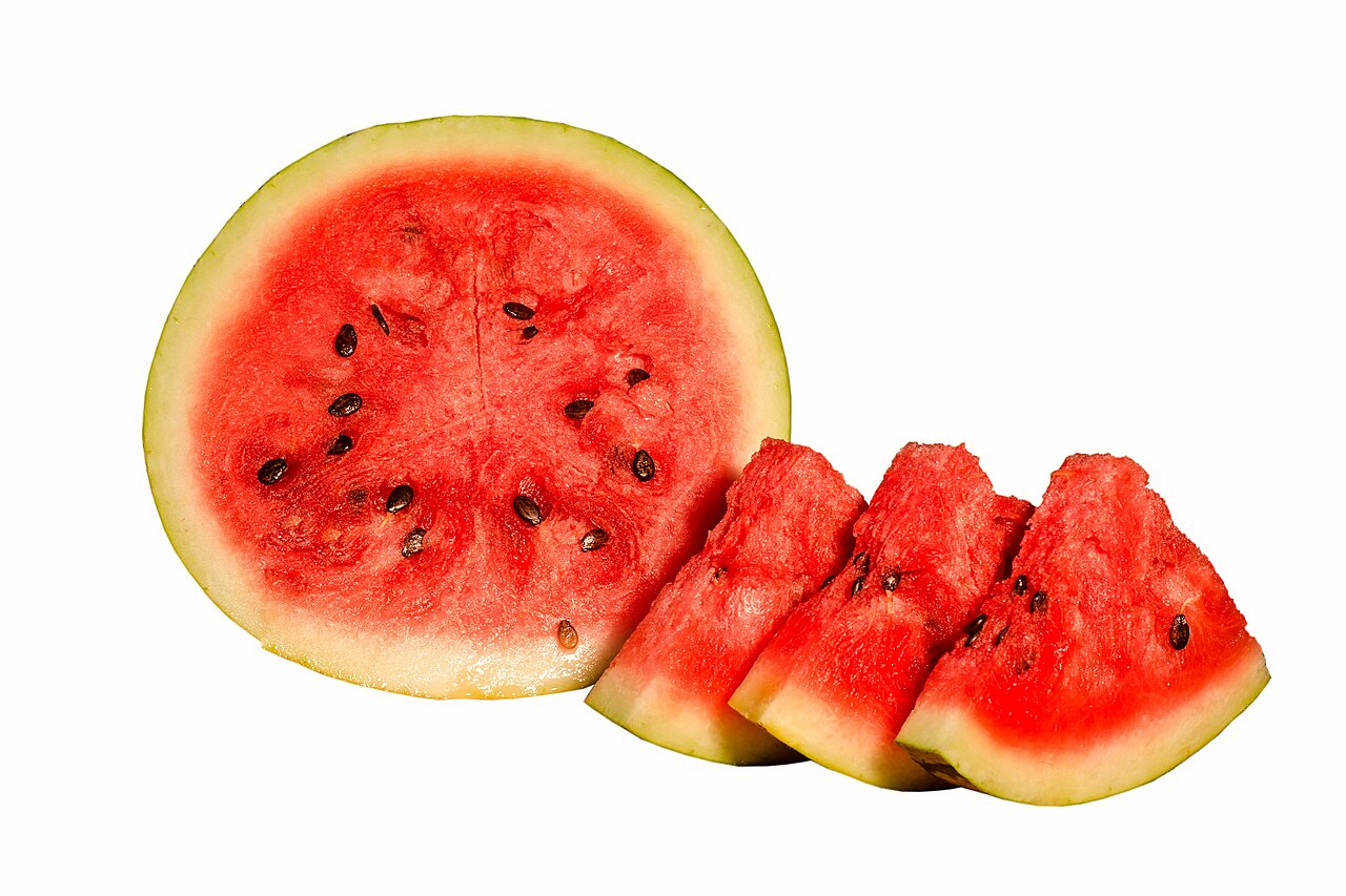 A big watermelon cut open to show its red, juicy inside.