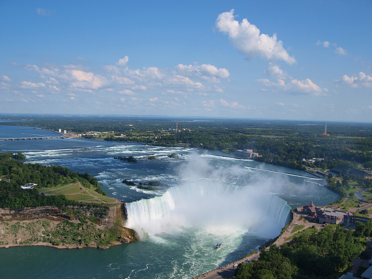 The wide Horseshoe Falls roar down from high above.