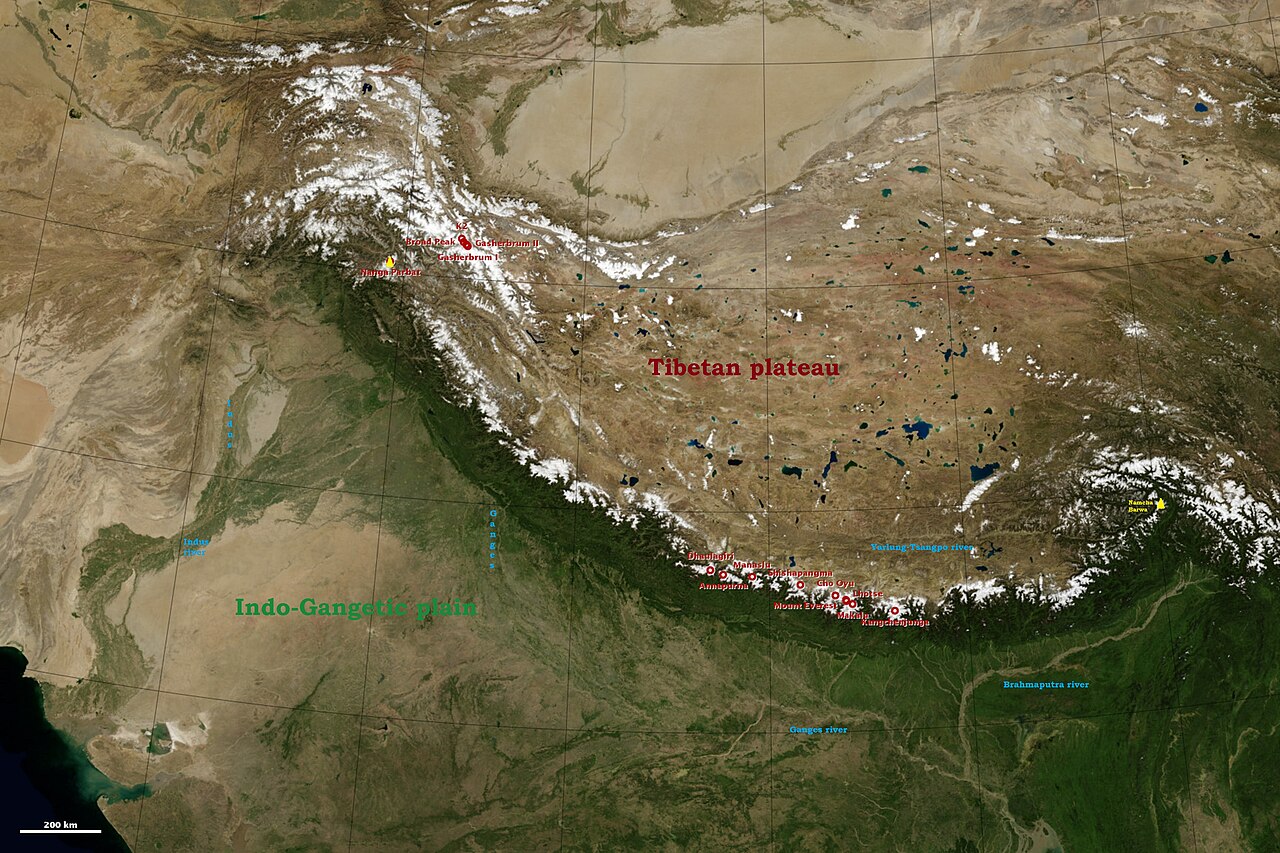 A space view shows the tallest Himalayan peaks and rivers.