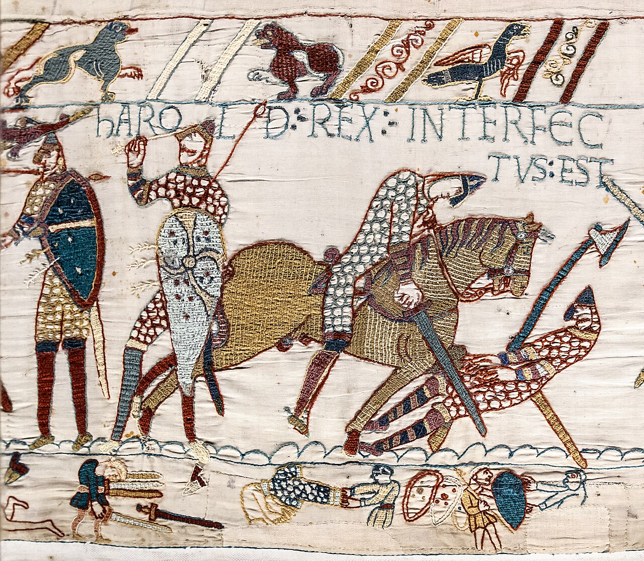 A stitched cloth picture showing knights fighting in a big battle.