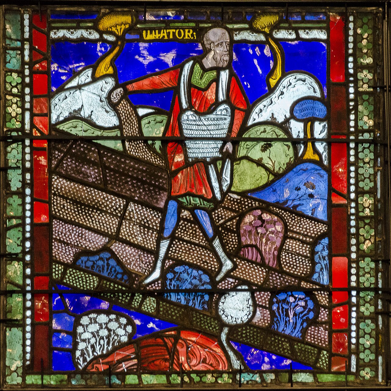 A medieval painting of a farmer planting seeds in a field.