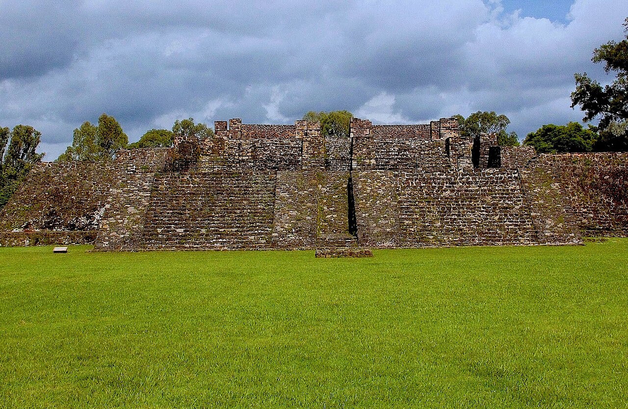 A stone step pyramid built long ago by the Aztec people.