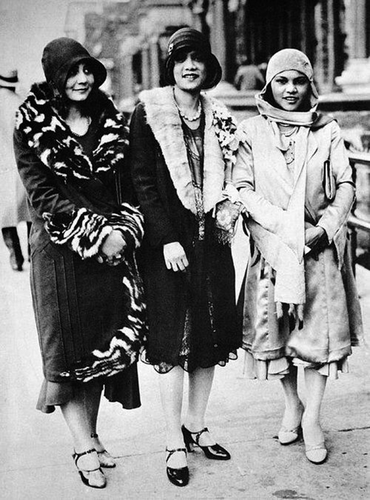 Three women pose in Harlem during a time of great art.
