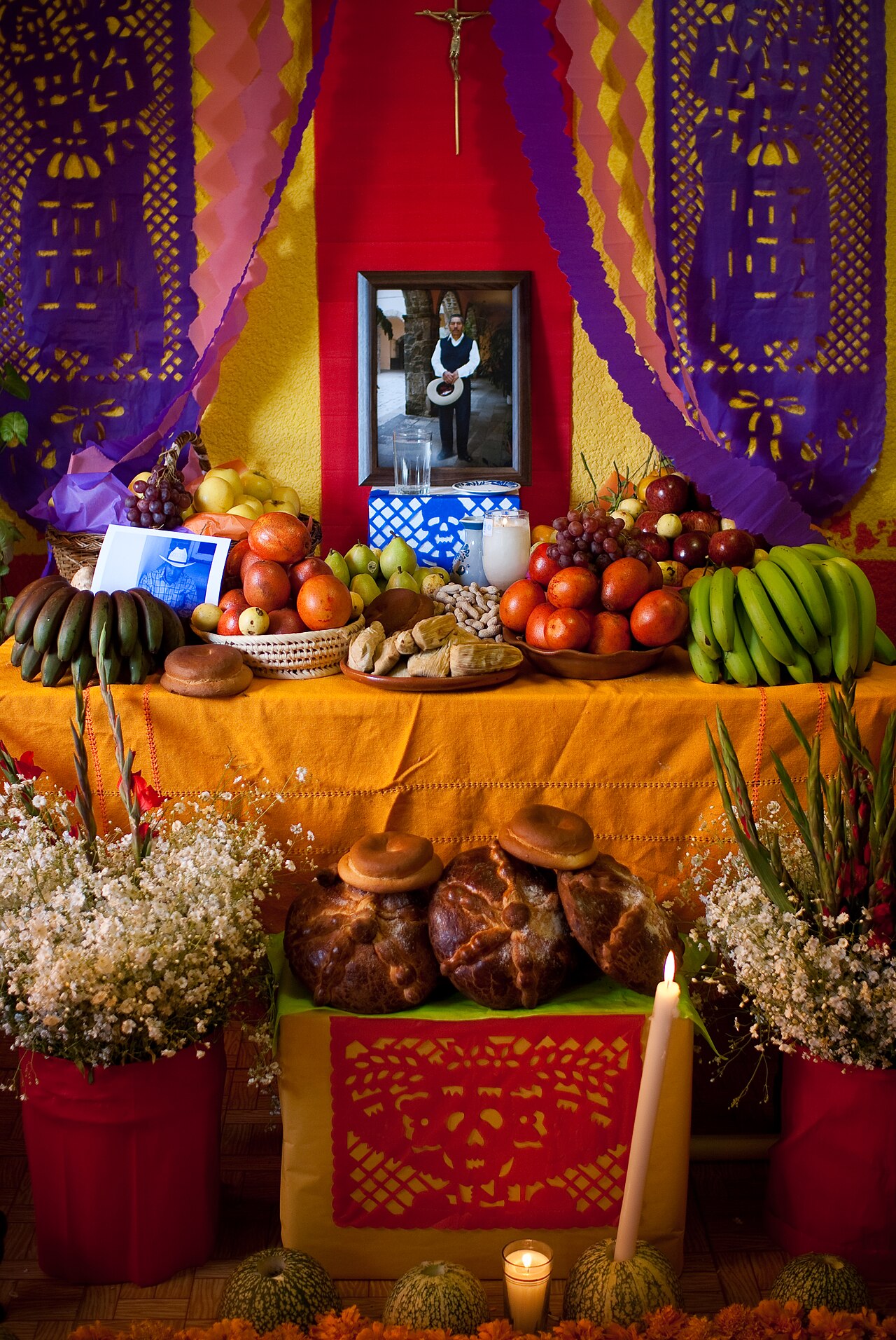 A colorful altar honors loved ones on the Day of the Dead.