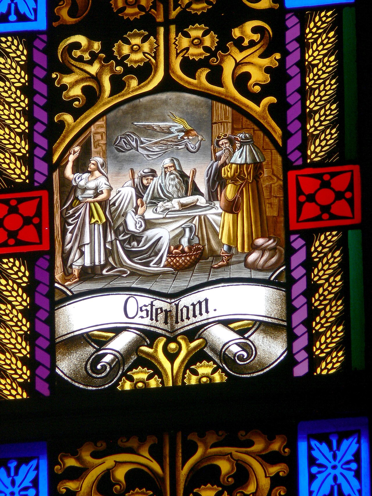 A pretty stained glass window shows a lamb for Easter.