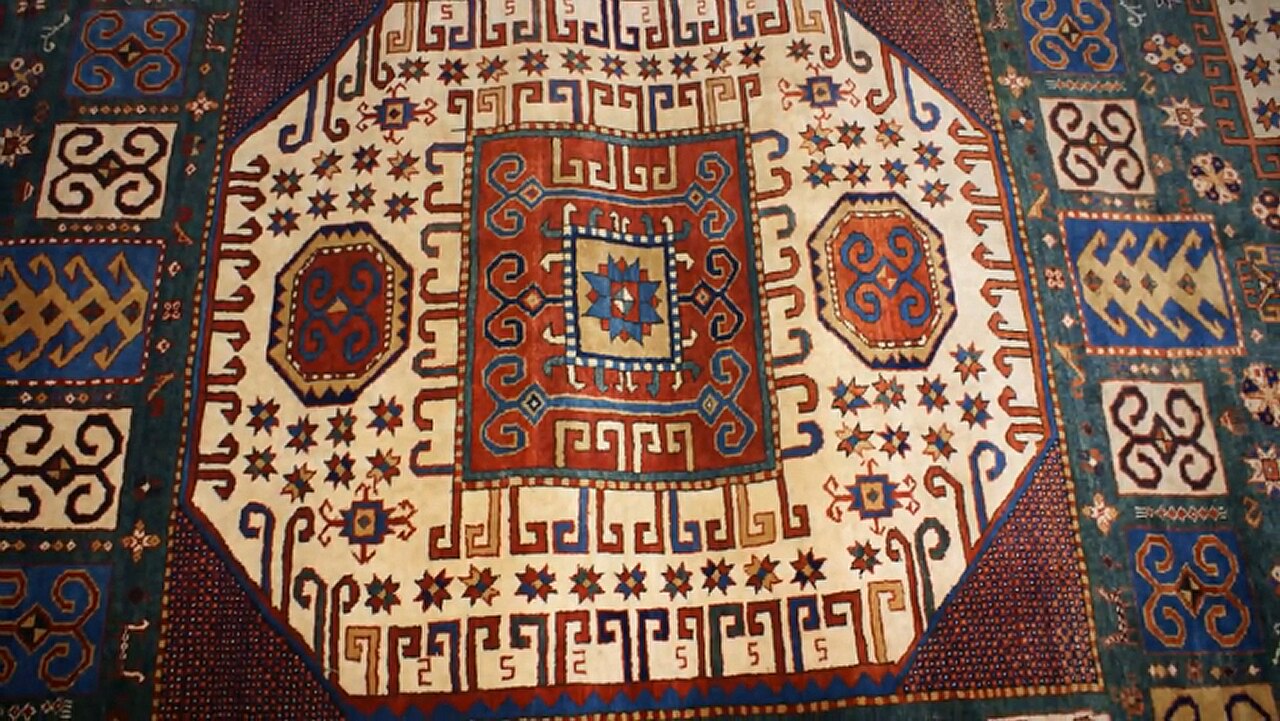 A beautiful handmade carpet with colorful patterns from Eid.
