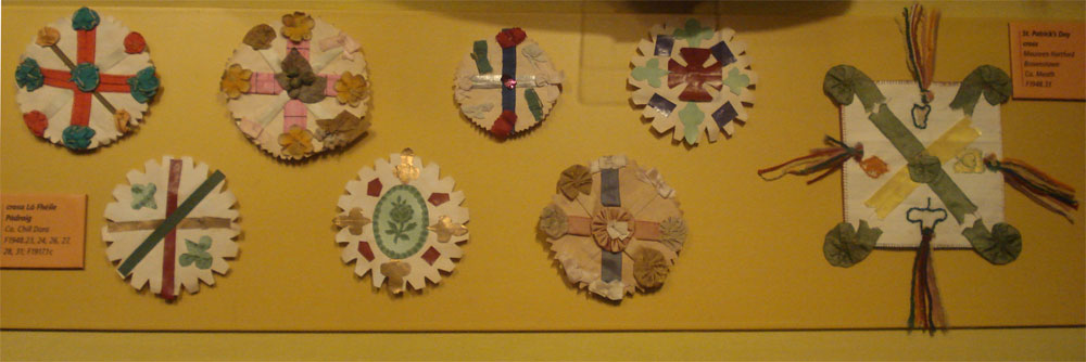 Old green badges people wore for Saint Patrick's Day long ago.