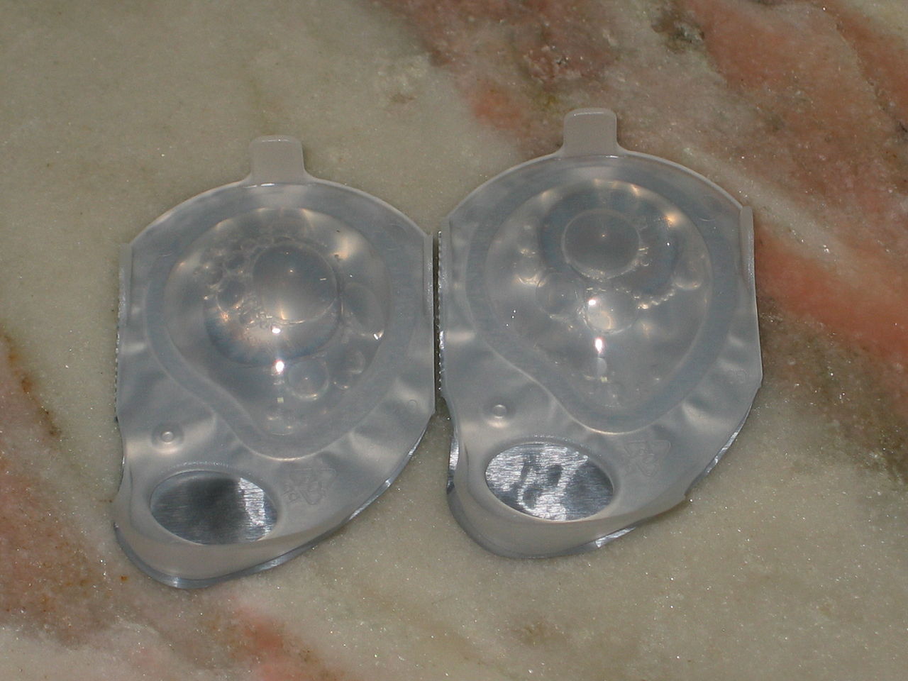 Tiny blue contact lenses that sit on your eye.