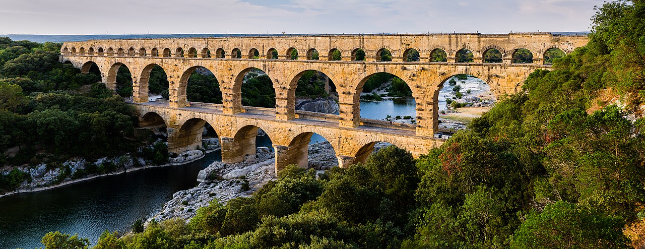 A huge stone aqueduct built long ago by the Romans.