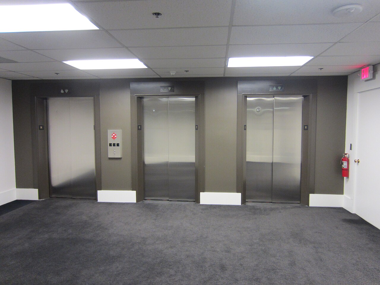 A tall building where elevators lift people up and down.