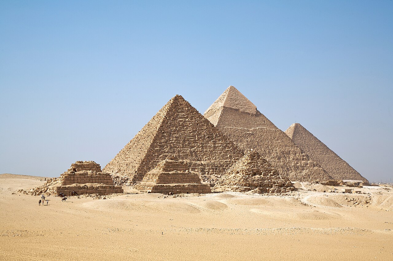 The giant pyramids at Giza show huge triangle shapes.