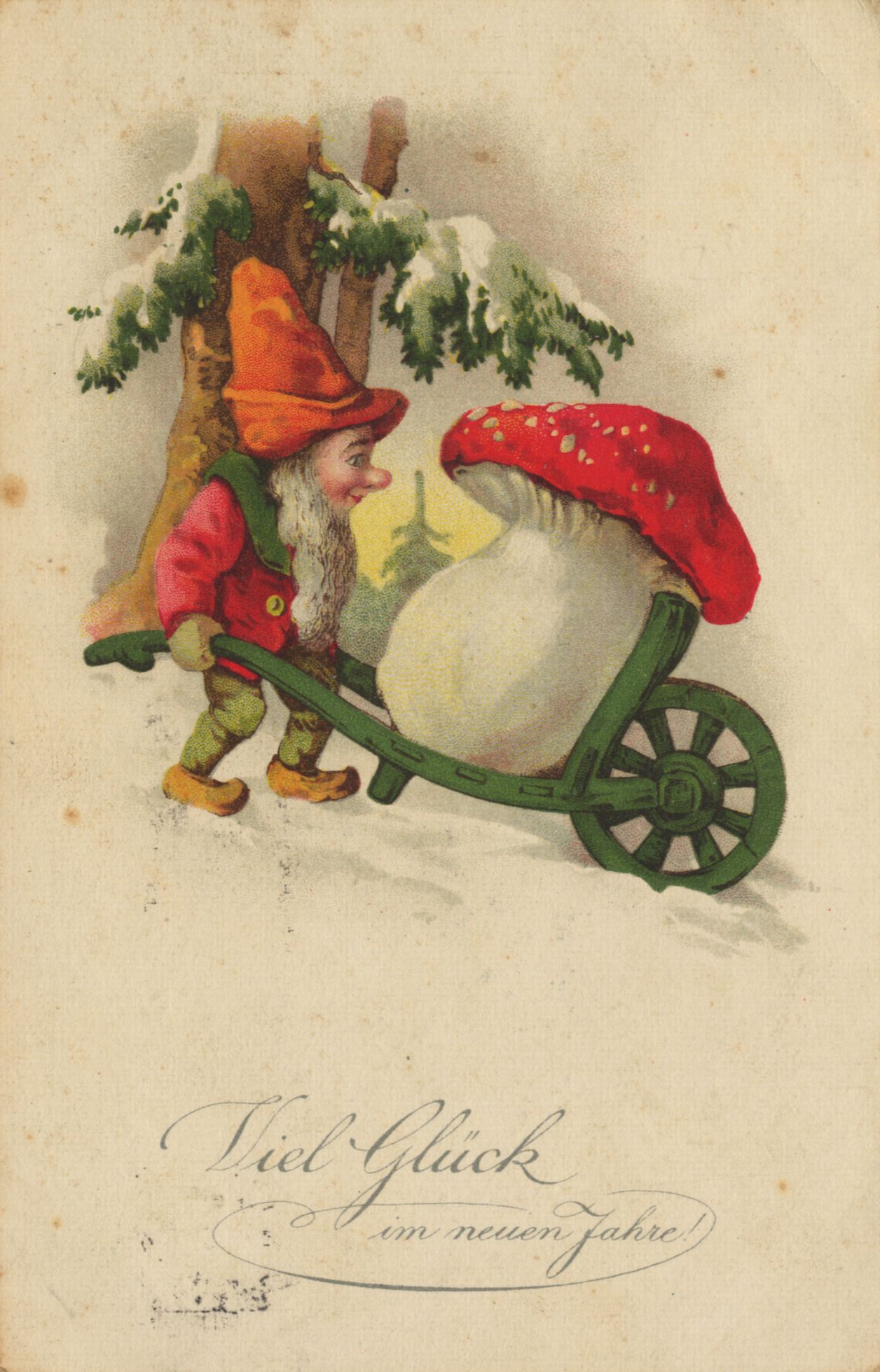 An old postcard showing a gnome next to a red mushroom.
