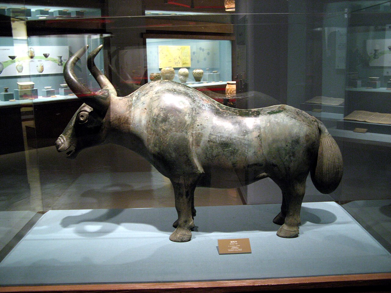 A shiny bronze yak statue from long ago.