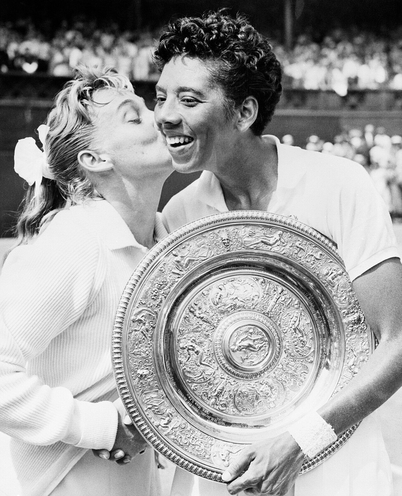 Althea Gibson celebrating her 1957 Wimbledon tennis win.