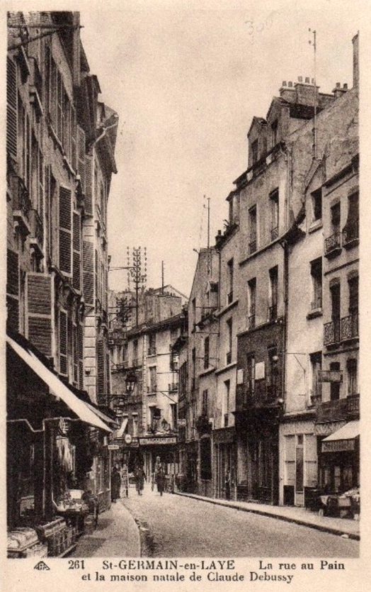 An old postcard showing the house where Claude Debussy was born.