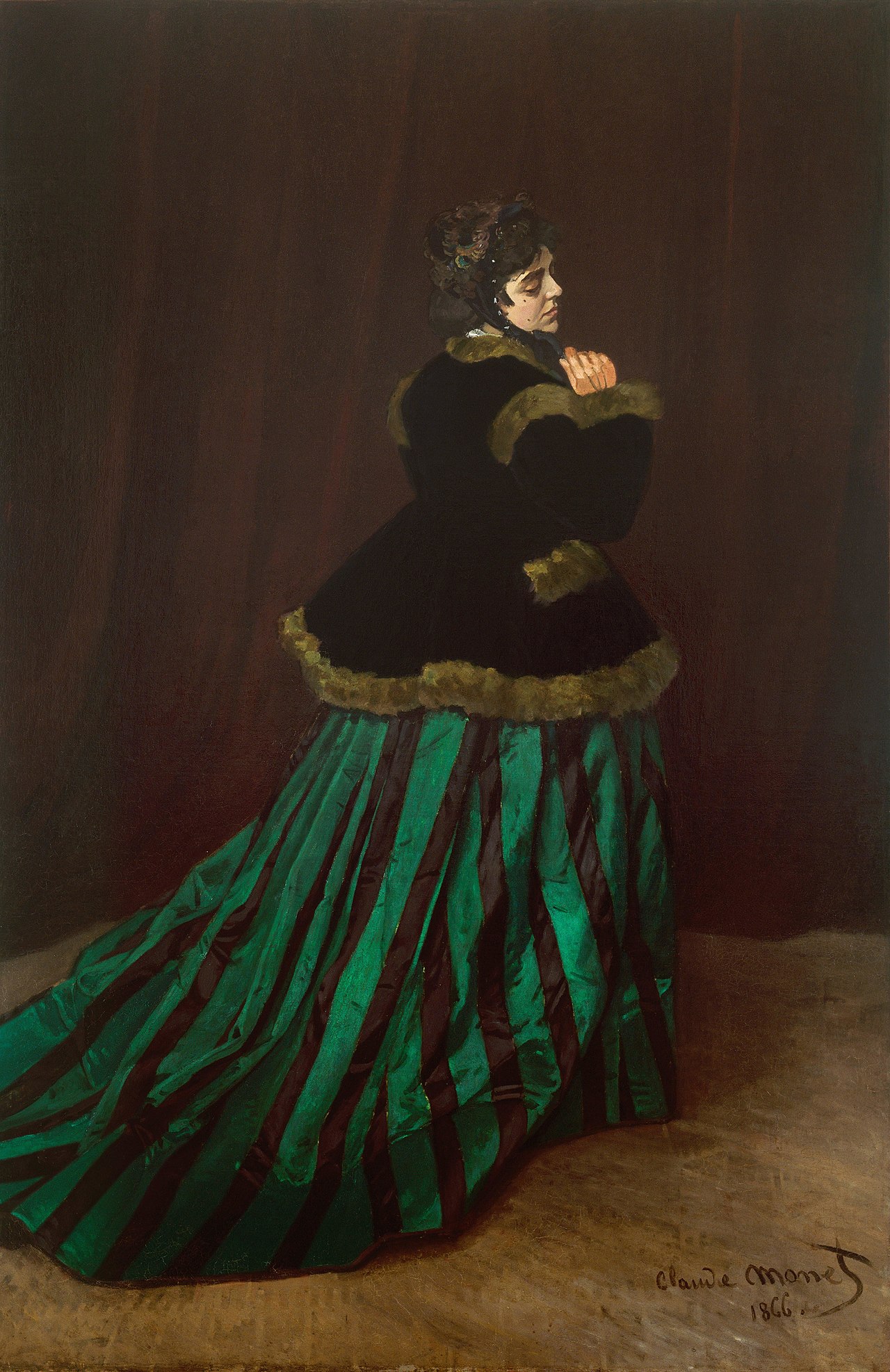 Camille, a famous painting by Claude Monet of a lady in a green dress.