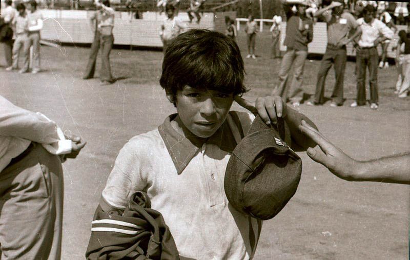 Young Diego Maradona playing for his childhood team in Argentina.