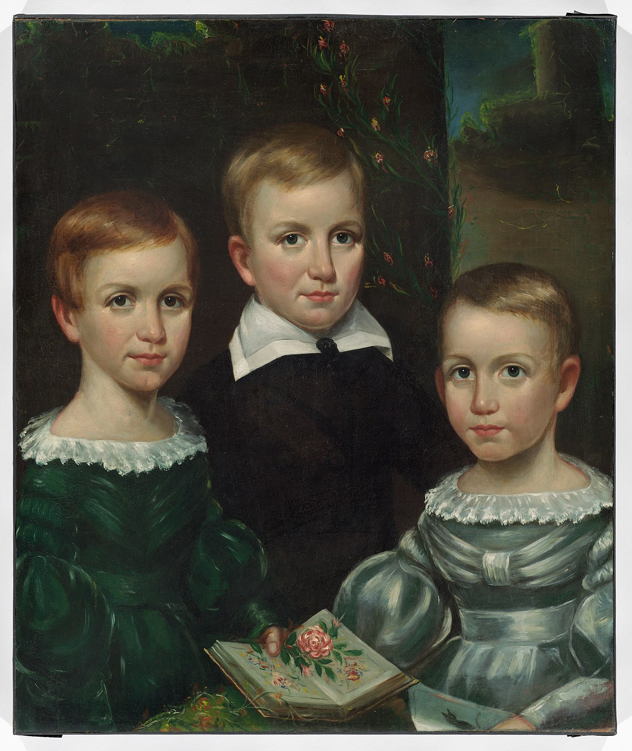 A painting of young Emily Dickinson with her brother and sister.