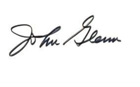 The handwritten signature of astronaut John Glenn.