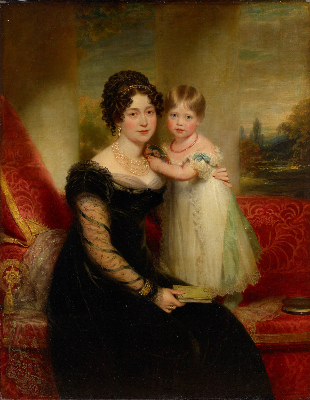 A painting of young Princess Victoria with her mother.