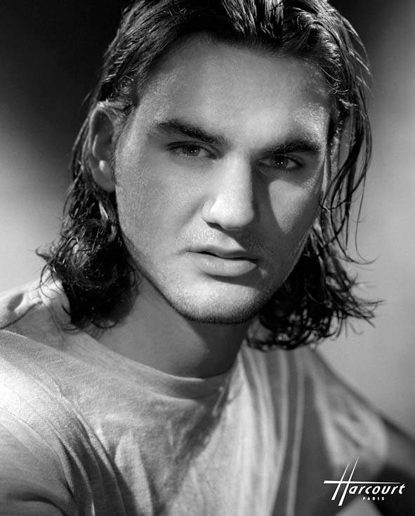 A studio portrait of tennis champion Roger Federer.