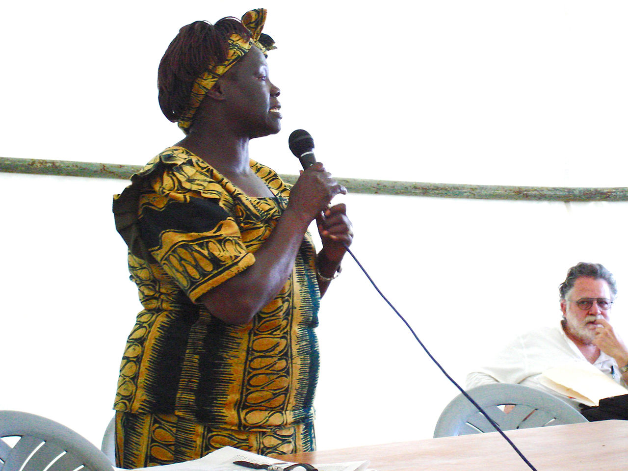 Wangari Maathai giving a speech about caring for trees.