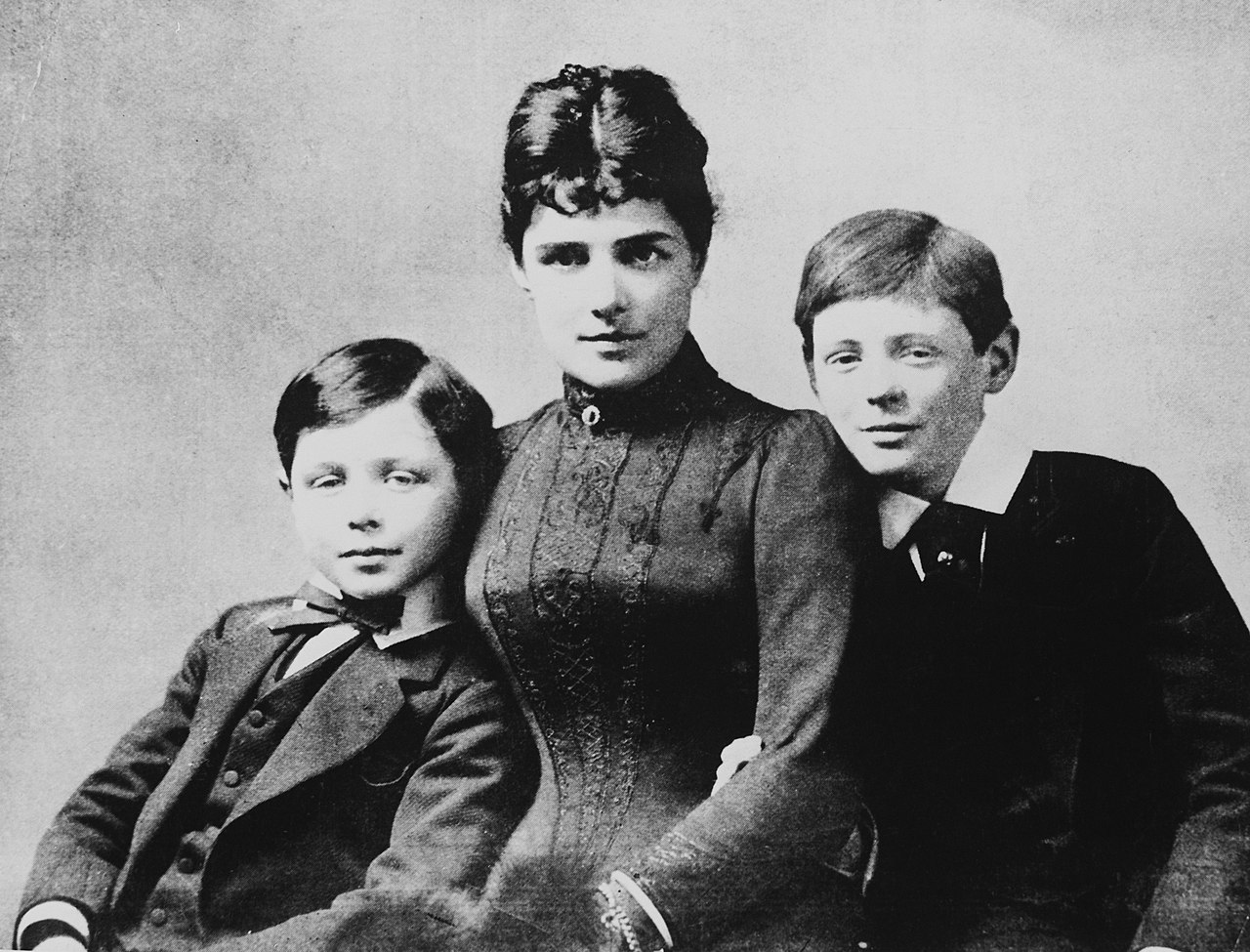 Young Winston Churchill with his mother and brother.