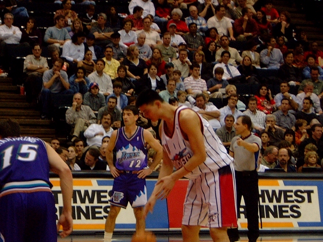 Basketball star Yao Ming getting ready to shoot a free throw.