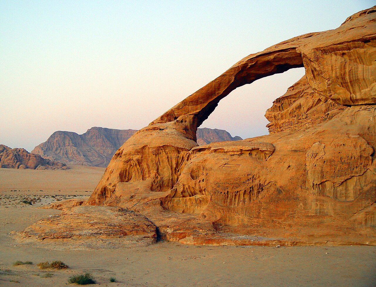 Wind and water slowly carved this big stone arch in Jordan.