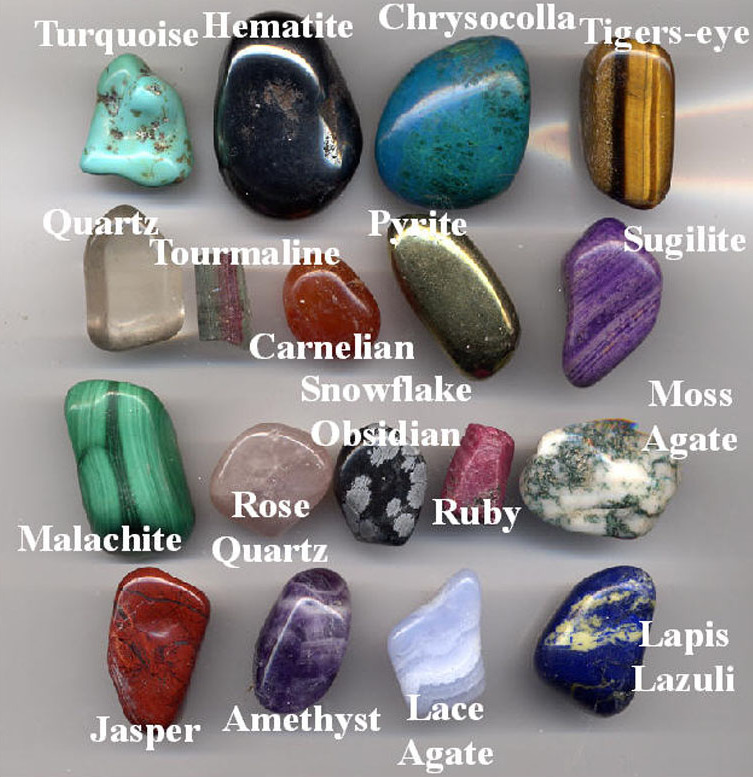 Rows of smooth, shiny, polished gemstones in many bright colors.