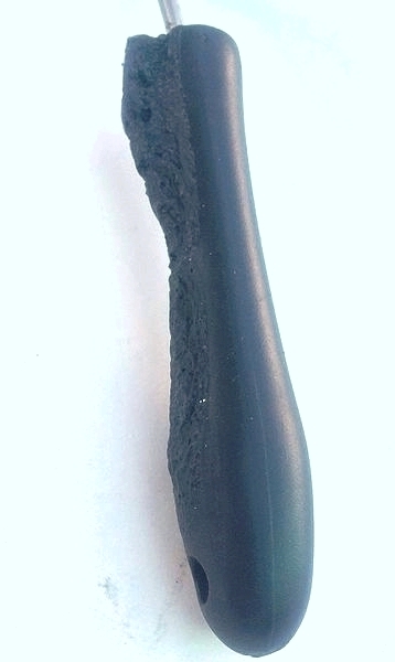 A plastic spatula handle that melted from too much heat.
