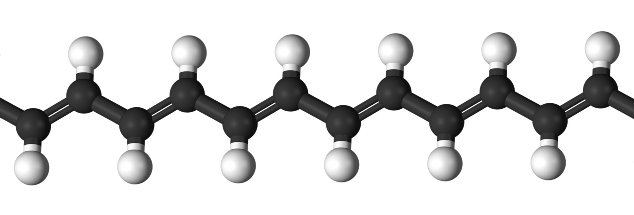 A model shows how tiny parts link up to form a long polymer chain.