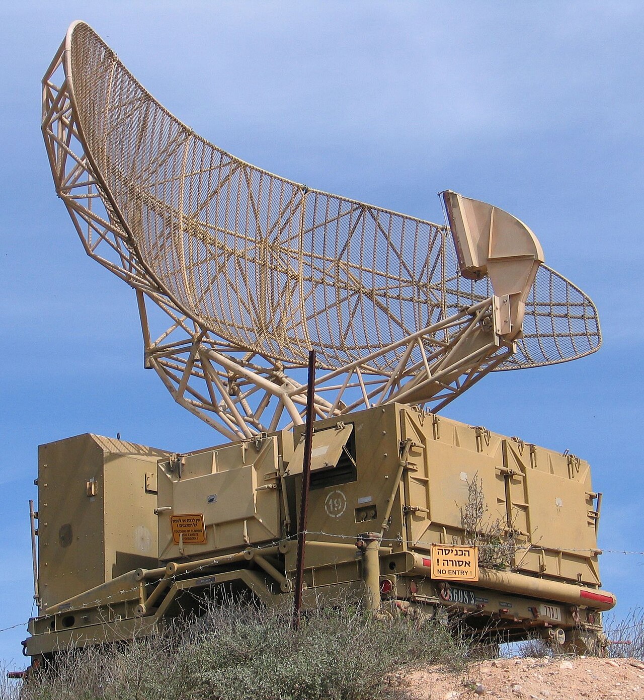A big radar dish at an air force museum watches the sky.