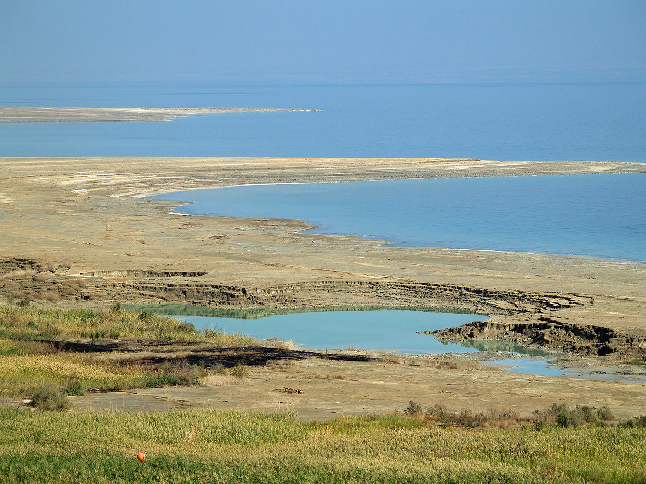 A huge round sinkhole opens in the ground near the Dead Sea.