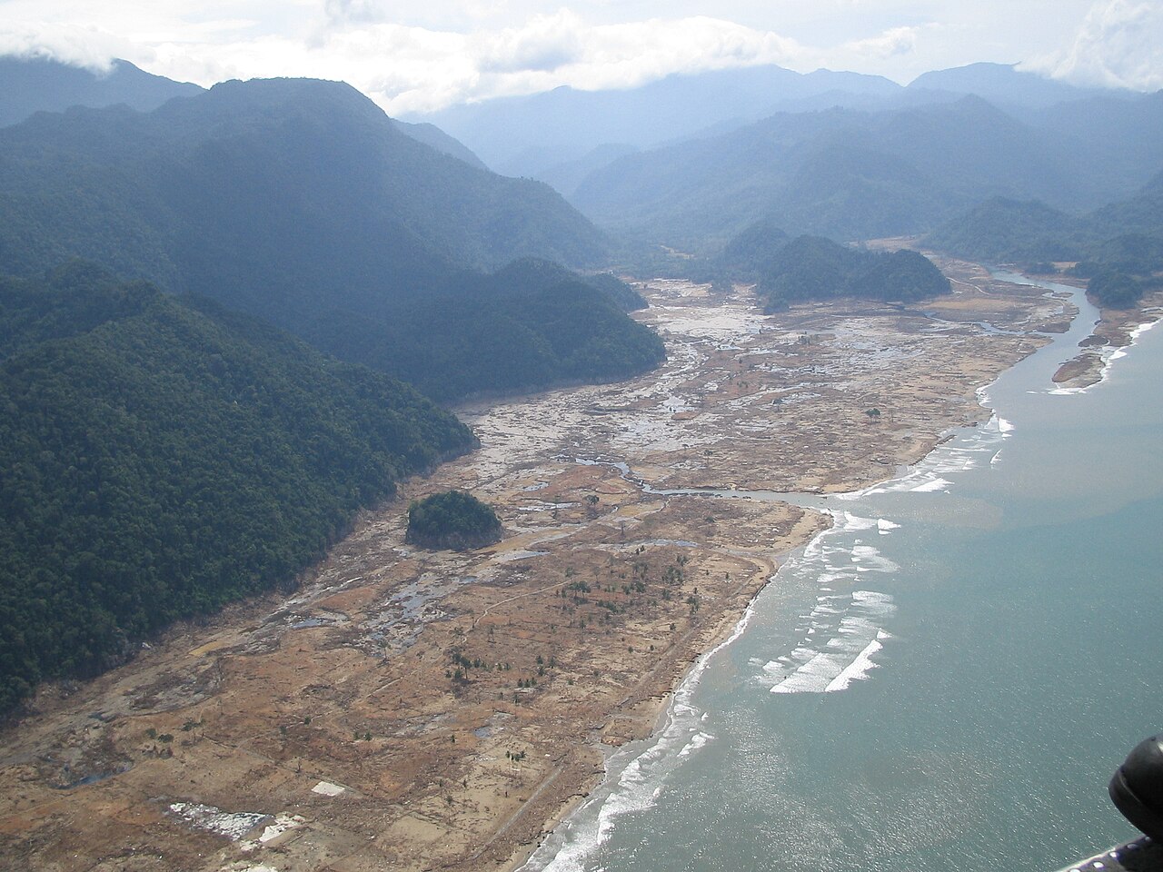 A coastal village after a huge tsunami wave swept through.