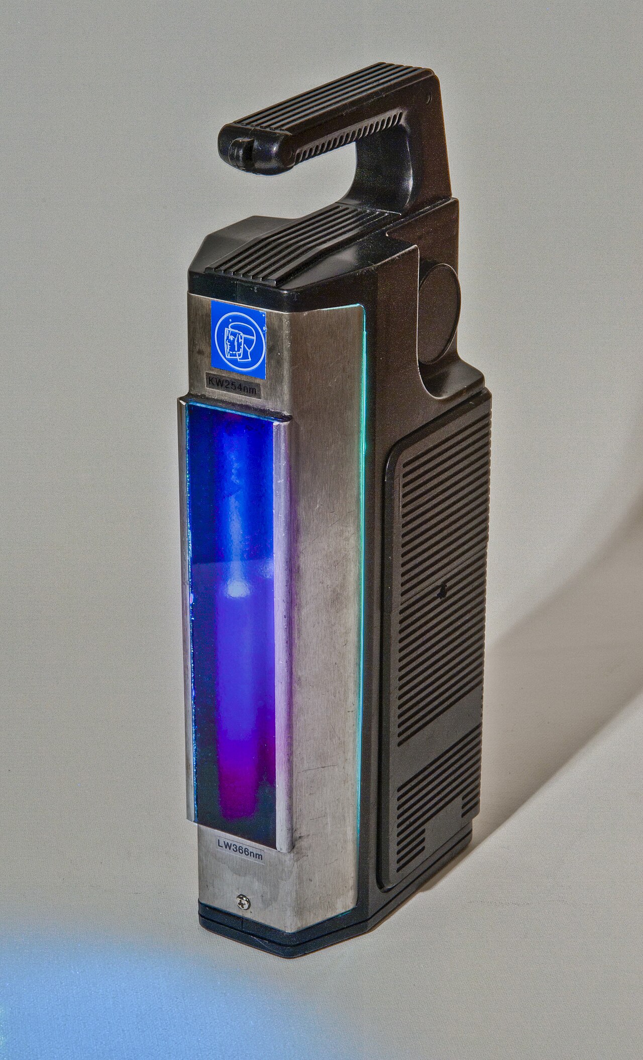 A small lamp that shines special ultraviolet light.
