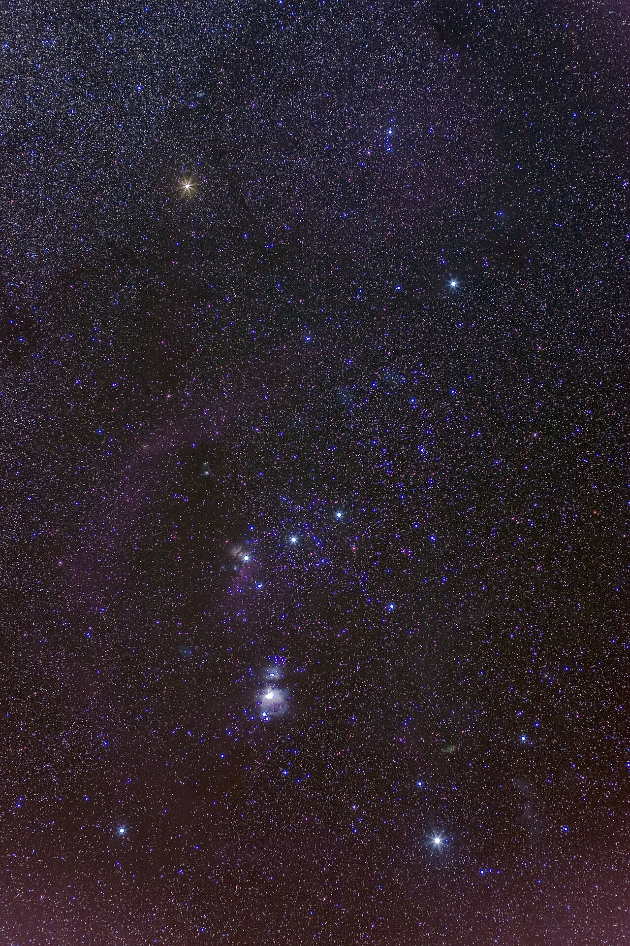 A deep view of the night sky showing the stars of Orion.